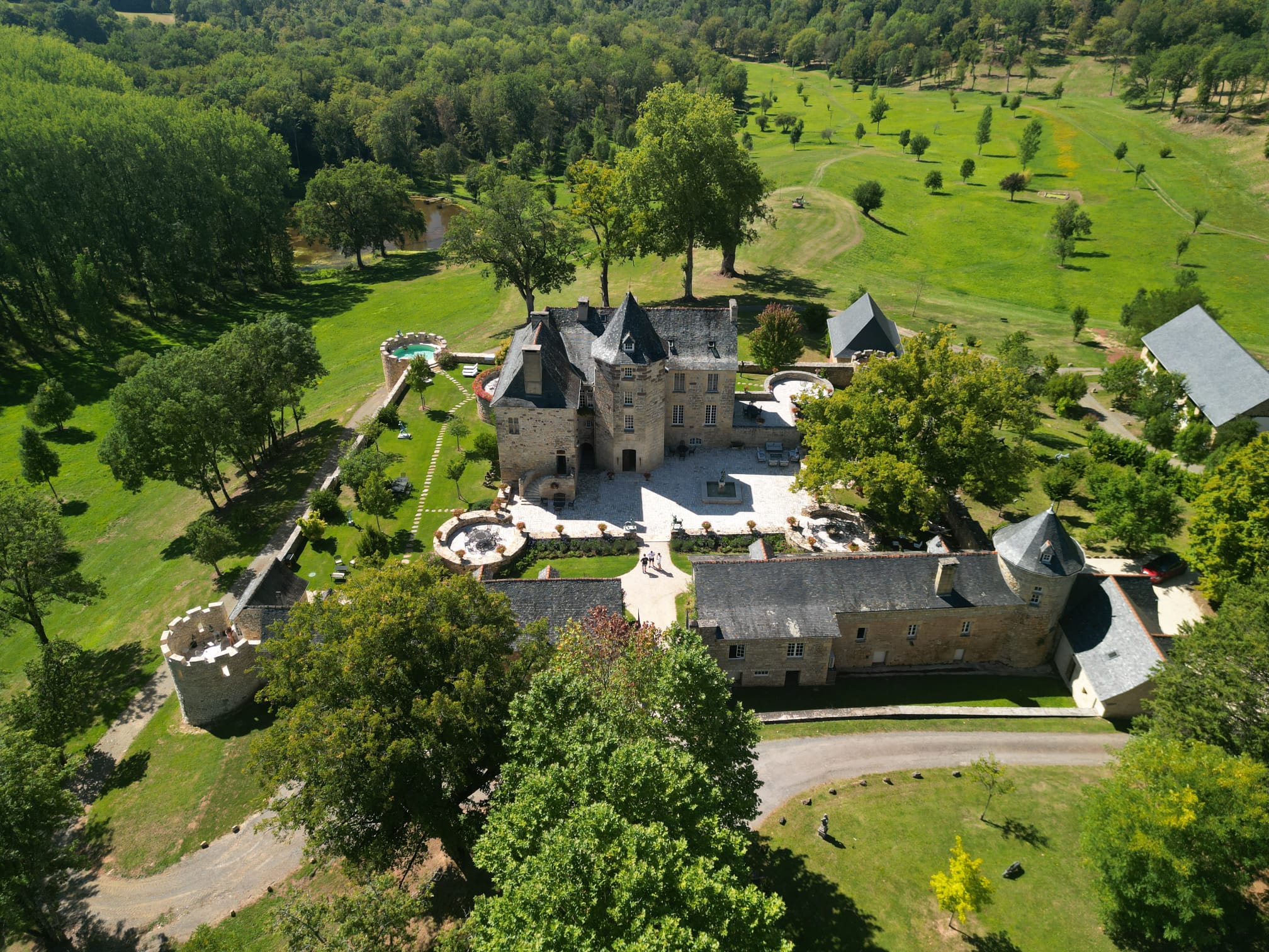 Aerial view over the château courtyard and surrounding lawns