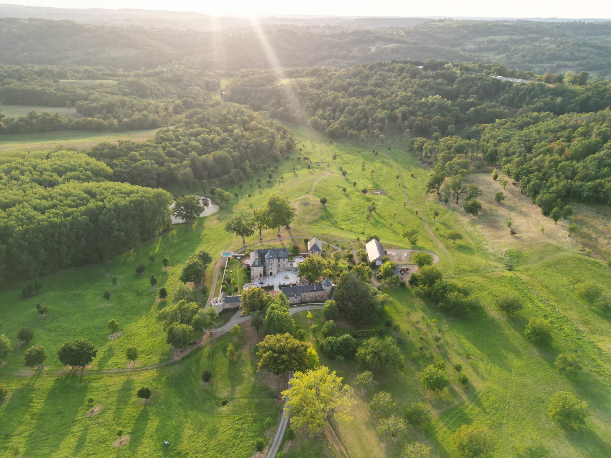Château de Lons surrounded by its extensive green estate